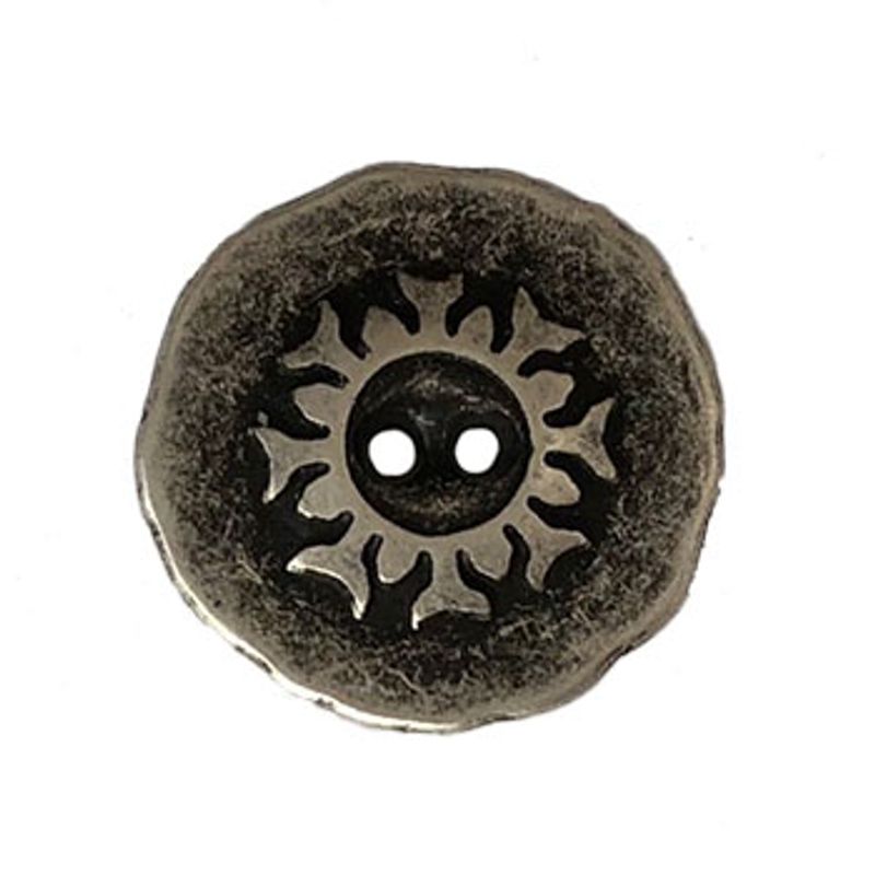 Rund metallknapp med mønster